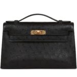 HERMÈS KELLY POCHETTE BLACK OSTRICH GOLD HARDWARE