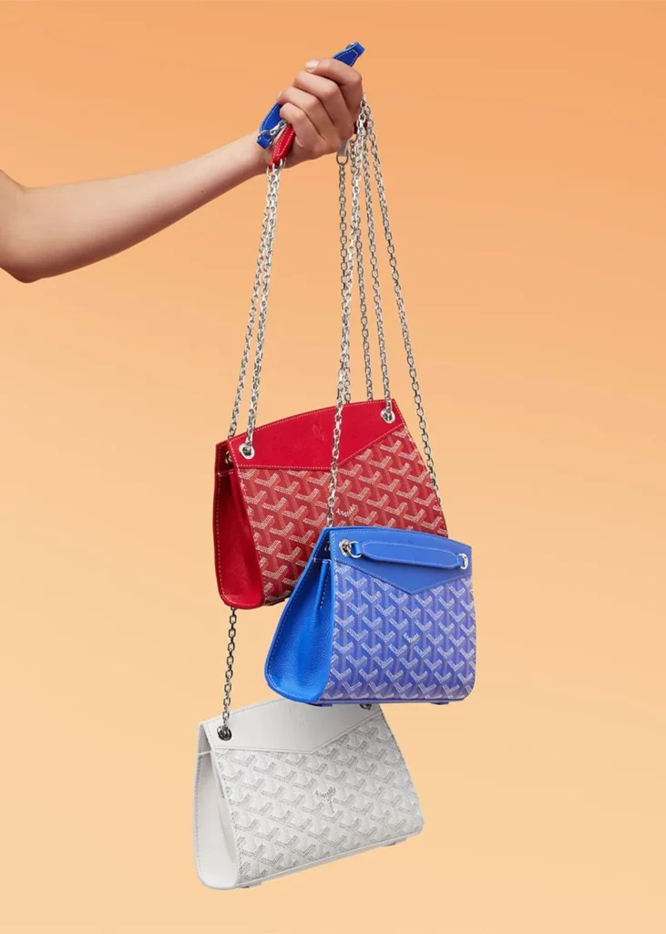 Authentic Goyard mini bags — compact Goyardine canvas carry with chain strap in tan-on-natural colorway, from the verified Goyard range at The Authentic Bags