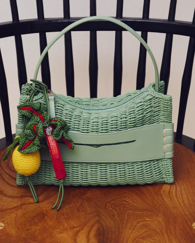 Authentic JW Anderson summer bags — warm-weather carry formats in fabric, leather, and mixed materials suited to resort, city, and social carry, from the verified JW Anderson range at The Authentic Bags