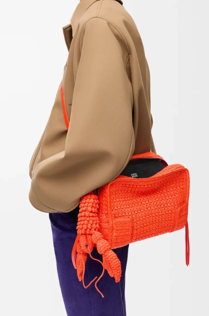 Authentic Loewe shoulder bags for women — calf leather strap-carry formats from structured flap designs to soft-body styles, worn on the shoulder or crossbody, verified originals at The Authentic Bags